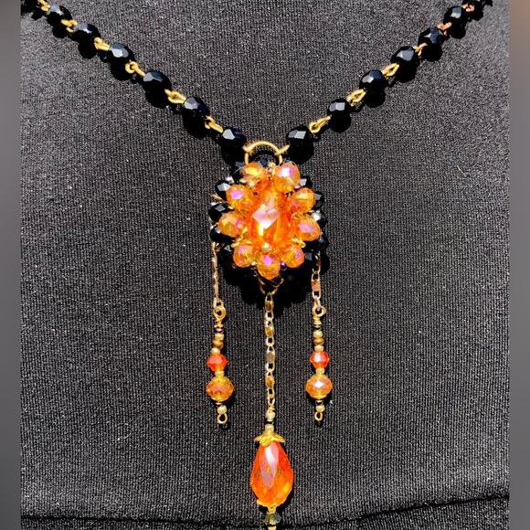 Handcrafted necklace of vivid peach & black vintage beads with dangling charms - Picture 1 of 8